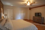 Master bedroom offers ensuite full bath and King bed
